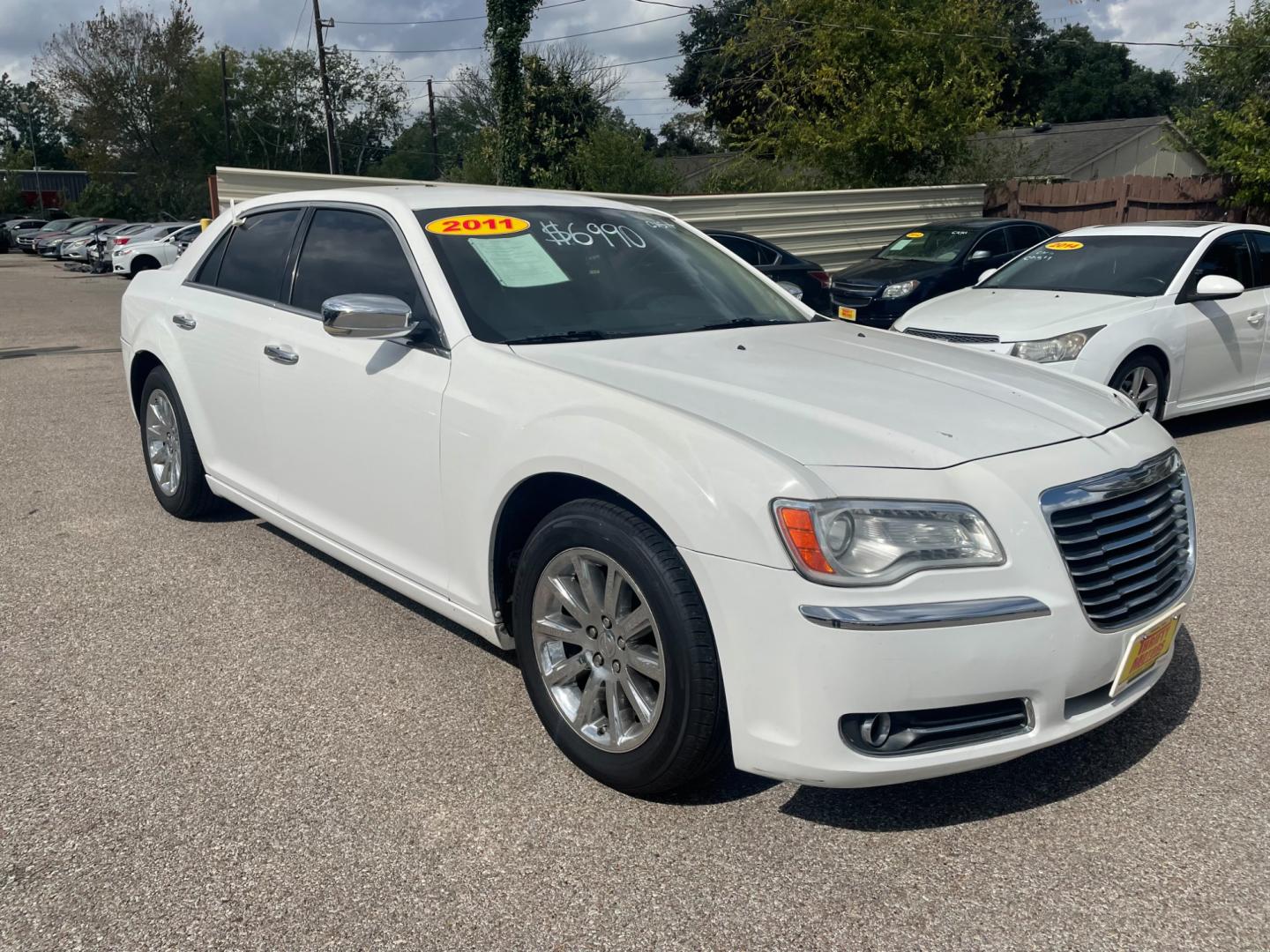 2011 Chrysler 300 Limited RWD (2C3CA5CG6BH) with an 3.6L V6 SOHC 24V engine, 5-Speed Automatic transmission, located at 16710 Clay Rd., Houston, TX, 77084, (281) 859-7900, 29.834864, -95.656166 - Photo#2