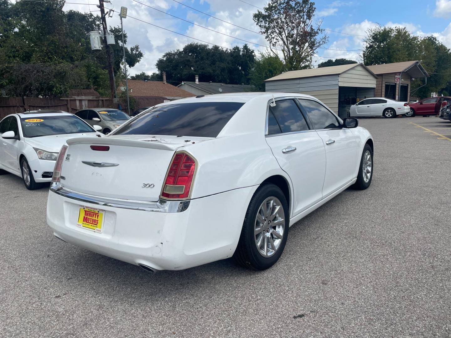 2011 Chrysler 300 Limited RWD (2C3CA5CG6BH) with an 3.6L V6 SOHC 24V engine, 5-Speed Automatic transmission, located at 16710 Clay Rd., Houston, TX, 77084, (281) 859-7900, 29.834864, -95.656166 - Photo#5